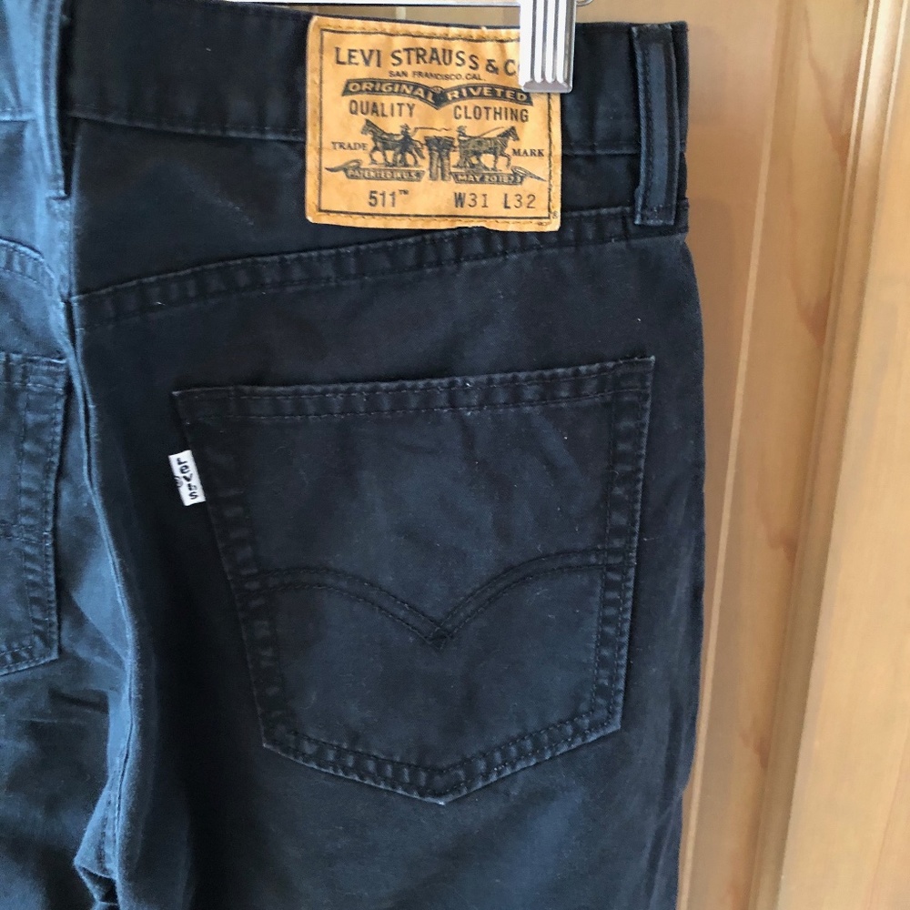 511 Levi's black jeans